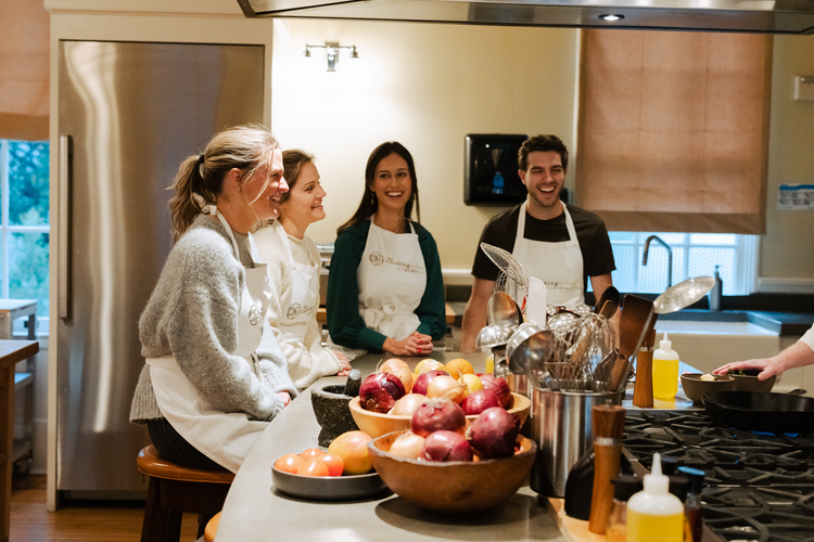Guests cooking together at Cavallo Point Cooking School